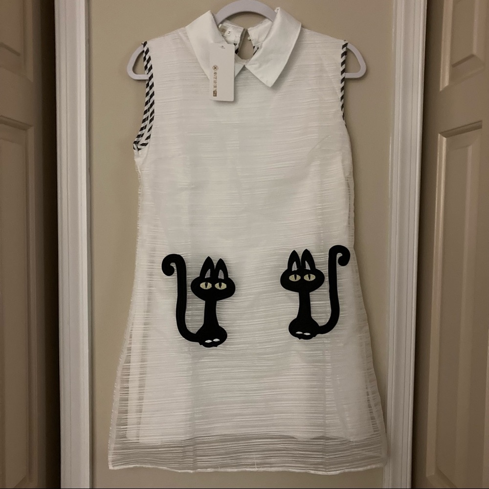 White dress with cat design
